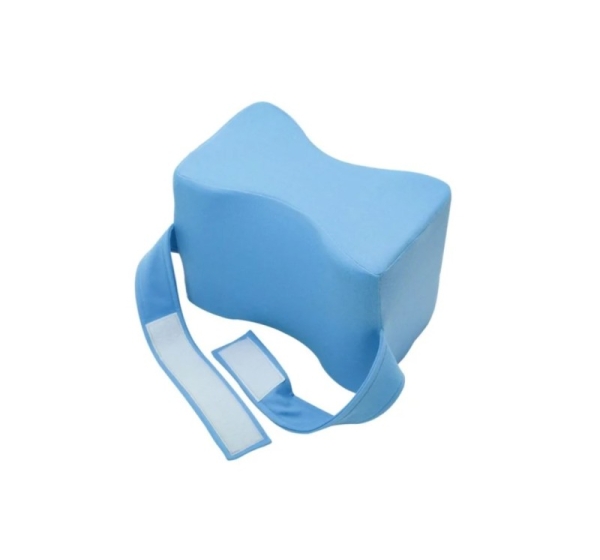 Wedge separator cushion between thighs with leg brace